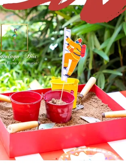 Another view of the firefighter-themed sandpit activity.