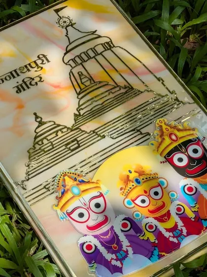 I recently made this Shri Jagannath Puri temple frame, and I absolutely love how it turned out. The 12 by 18-inch piece features a golden acrylic cutout of the temple and a UV-printed image of the deities, all on a beautiful marble-effect resin background.