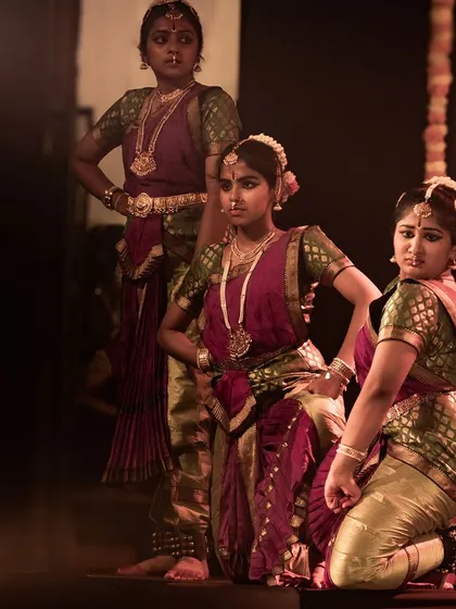 The senior dancers striking a powerful pose, embodying the strength of the characters they portray.