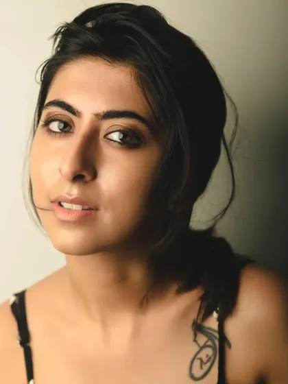 A simple yet powerful portrait using a single light source. Sometimes, a minimal setup is all you need to capture a compelling and intimate photograph.