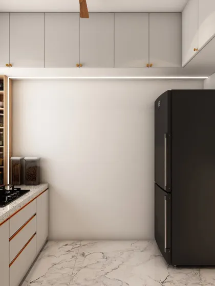 Another view of the white kitchen, showing the clean lines and uncluttered feel, with open shelving for easy access to everyday items.