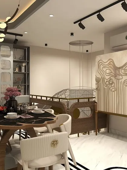 A view of the dining area in the Hemkunt project, featuring a custom bar cabinet with an epoxy resin finish and a unique leaf-shaped dining table.