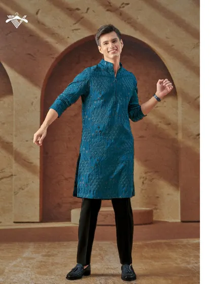 Radiate charm in this intricately detailed teal kurta. The unique texture and modern zip-front design make it a standout piece for any celebration.