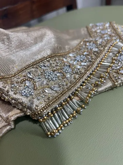 Another angle of the crystal and tassel embroidery, showcasing the fine craftsmanship.