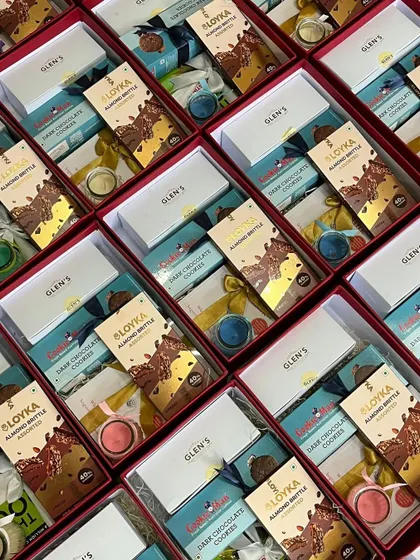 An overhead shot displaying multiple corporate gift boxes, emphasizing our capacity to handle bulk orders while maintaining high standards of quality and presentation.