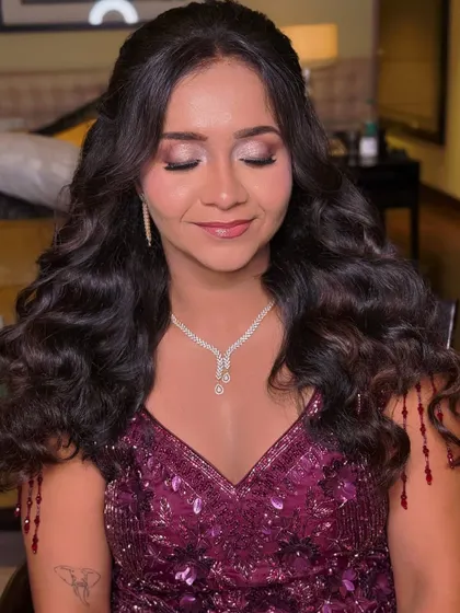 A close-up of the eye makeup, showing the soft blend of neutral shimmer. It's a perfect example of soft glam that enhances without overpowering.