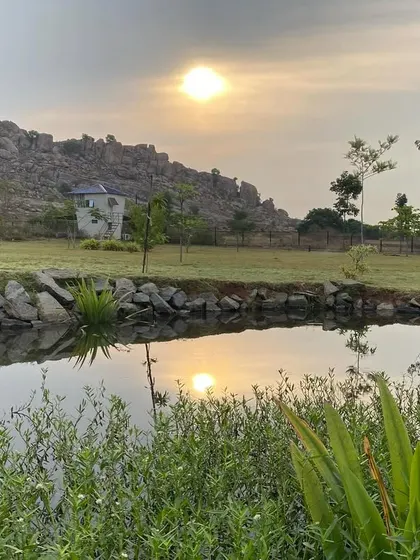 The morning sun reflects off the calm surface of our pond, with the hills waking in the background. This is the view that greets you, a picture of pure tranquility to start your day.