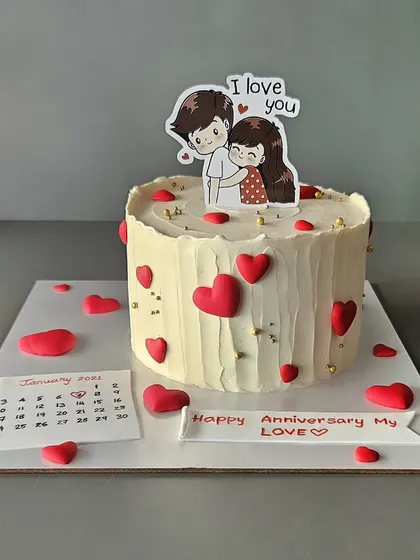 A sweet anniversary cake with a "save the date" calendar detail. This red velvet cake is a romantic way to celebrate a special milestone.