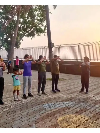 Every session begins with proper warm-ups. Here, students are guided through exercises that prepare their muscles for shooting and help prevent injuries.