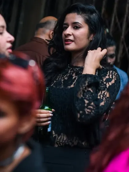 A candid of a guest enjoying the music.