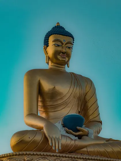 The golden Buddha statue at Dalai Hills against a brilliant turquoise sky. The colors in this shot are just as I saw them, no filter needed.