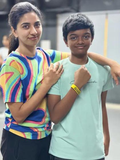 Congratulations to Rushil for winning the yellow band with maximum points in the latest test, seen here with his instructor Nisha.