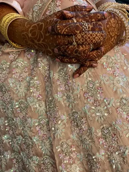 A beautiful, mature henna stain for an engagement ceremony. Even without full bridal coverage, the rich color makes a statement. This is the result of using pure, natural henna and proper aftercare.
