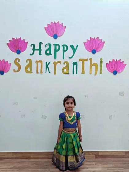 A duplicate of a previous image, showing a student dressed for the Makar Sankranti celebration.