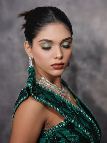 A close-up of the eye makeup with eyes closed.