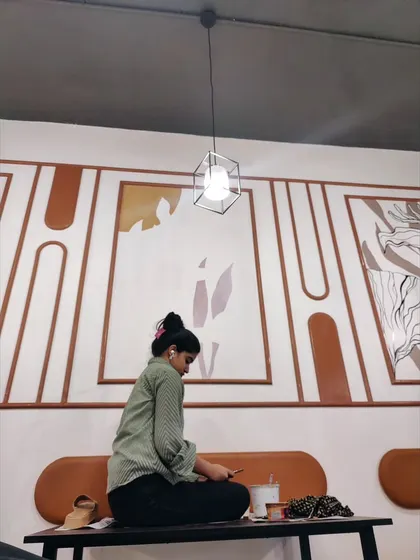 Taking a quick break in front of the nearly finished restaurant wall.