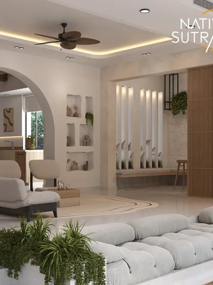 This perspective highlights the built-in niches and the connection to the dining area. The entire space is designed to feel like a calm refuge, with a focus on simplicity and natural light.