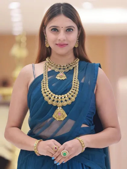 A classic half-body portrait, ideal for showcasing a full set of necklace, earrings, and bangles.