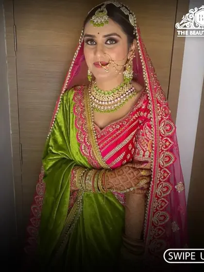A beautiful smile from a happy bride. Her makeup features a classic winged liner and a soft lip color that perfectly matches her traditional wedding attire.