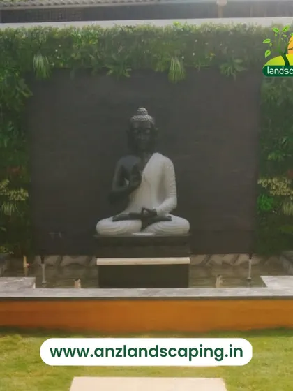 This water feature combines a calming fountain with a Buddha statue, framed by a living vertical garden wall for a truly immersive and peaceful experience.