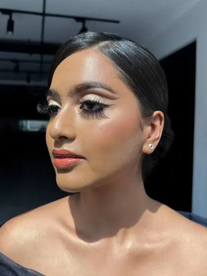 A detailed shot of the full cut crease look, showing the seamless blend of the crease color and the sharp definition of the liner. I paired it with a sculpted brow and a peachy nude lip.