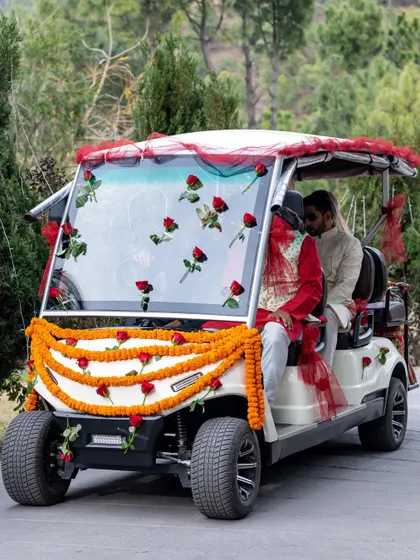 A decorated buggy ready for the bride and groom's entry or exit at a resort wedding.