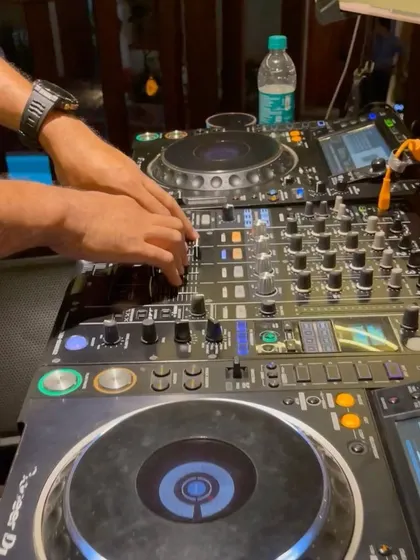A detailed shot of the Pioneer DJ mixer. This is the heart of my setup, where I control every element of the sound.