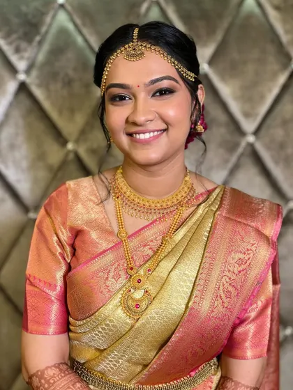 Her smile says it all. The makeup is designed to be timeless and elegant.
