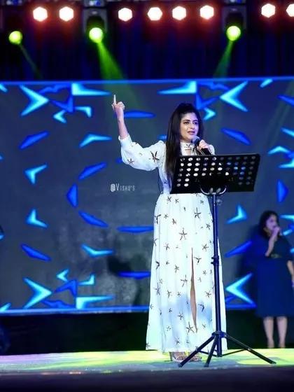 Commanding the stage during a corporate concert. We tailor our setlist to fit the event, from nostalgic classics to current Bollywood hits.