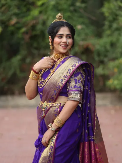 This royal purple ready-to-wear Nauvari with gold jewellery is a complete bridal look. Perfect for a Maharashtrian wedding.