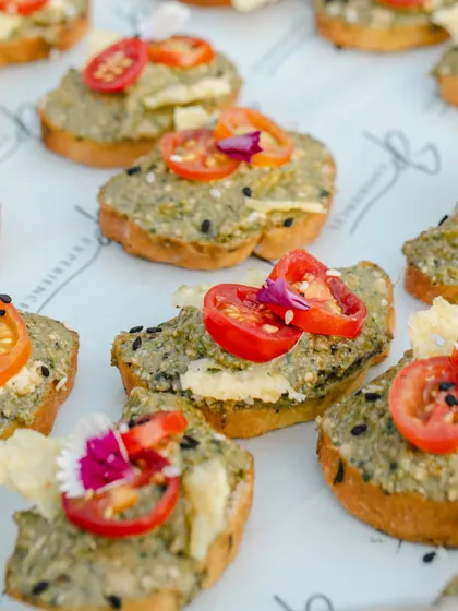 Avocado & Ricotta Crostini with walnut pesto and cherry tomatoes, another delicious option from our high tea spread.