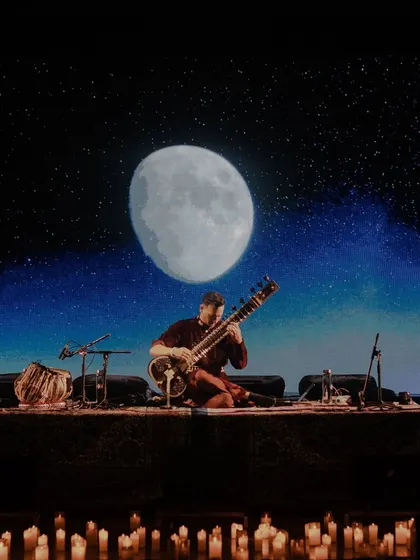 The moon and stars stage design, a signature of my tour. This visual theme enhances the meditative and cosmic feel of the music.