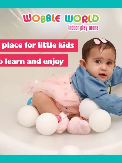 Even the tiniest babies can enjoy Wobble World. This infant is safely exploring the soft textures and shapes in our toddler-friendly zone.