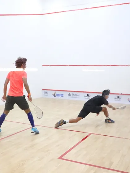 A full-stretch lunge during a quarter-final match. These are the moments of dedication that define our tournaments.