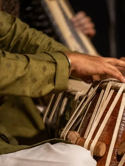 A close-up of my hands during a concert in Bangalore. The microphone is placed to capture the nuances of the tabla bols.