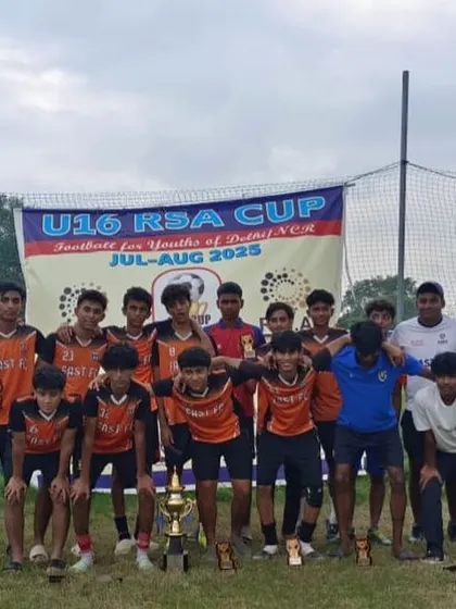 The full U16 squad posing with the runners up trophy after the RSA Cup finals. Every tournament is a valuable experience in a player's development journey.