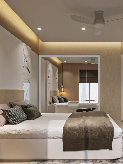 A bedroom designed with soft textures and natural elements. The wall behind the bed features a beautiful marble-patterned panel, while a large mirror cleverly conceals the wardrobe and makes the space feel larger.