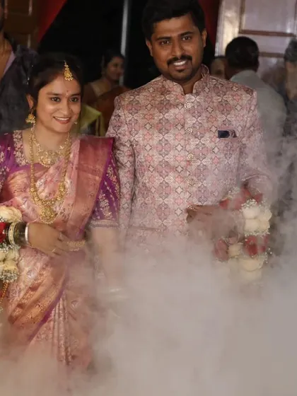 We help you make a grand entrance. Here, we coordinated a dramatic smoke effect for the couple's entry, adding a magical touch to their wedding reception and creating an unforgettable moment.