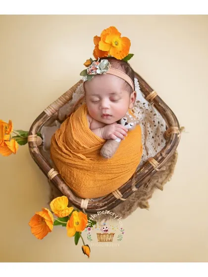A duplicate of image 16, showing the same beautiful setup. The warm tones and floral elements make this a really eye-catching portrait.