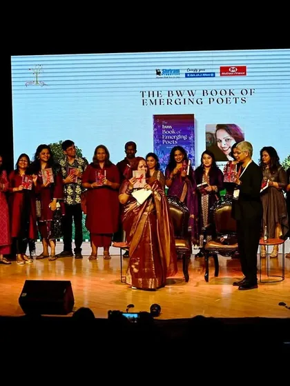 The full stage of our poets at the Bengaluru Poetry Festival, taking a moment to acknowledge the applause and support from the audience. A truly magical moment.