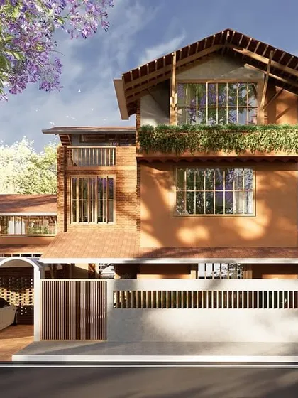 This residence fuses vernacular and contemporary design, featuring exposed brick, a sloping tiled roof, and green terraces for biophilic living. A vaulted carport and a semi-permeable boundary wall balance functionality with a contextually rooted aesthetic.