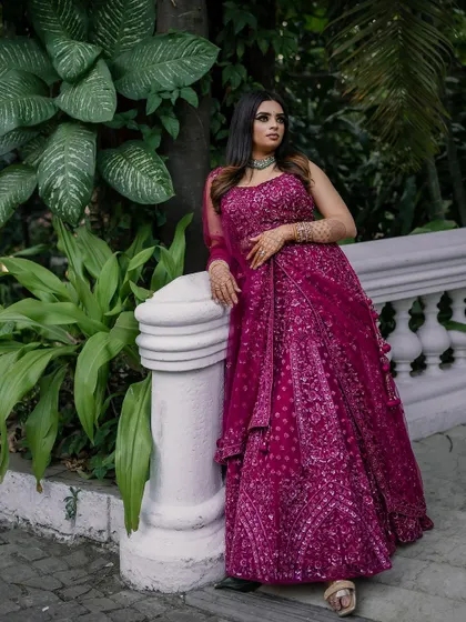 A stunning reception look at the Taj Westend. We use dramatic lighting and elegant backdrops to create sophisticated and timeless portraits for your evening events.