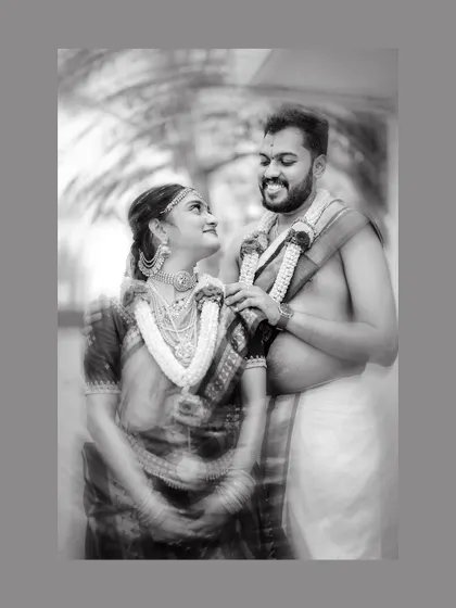 A dreamy, artistic black and white portrait of the couple, with a motion blur effect that adds a touch of magic.