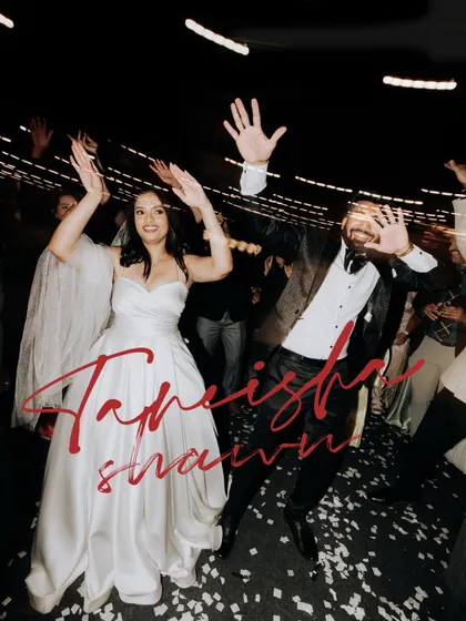 A fun, high-energy shot of the couple dancing with their guests, captured with a creative motion blur effect.