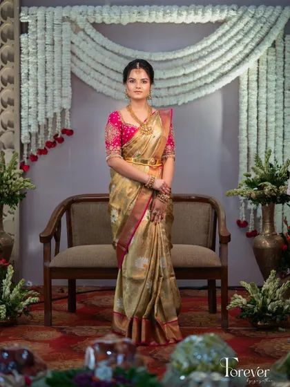 A portrait of grace for a Muhurtham ceremony. This look blends classic tradition with modern charm, featuring soft makeup that enhances her individuality while honoring the elegance of her South Indian heritage.