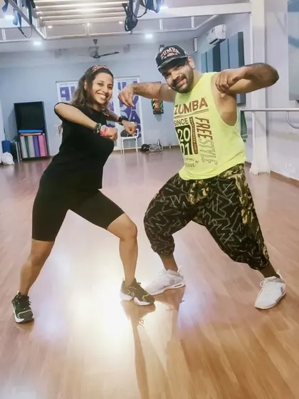 Posing with my mentor after the Rhythms 3 training. Learning from him helps me evolve as an instructor.