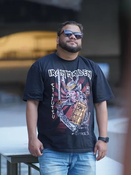 One filter coffee please. A candid shot of me in my Iron Maiden shirt, enjoying a moment of calm.