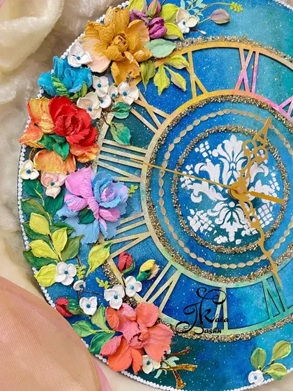 Another angle of the galaxy-themed clock, focusing on the cluster of flowers. I used a mix of roses, hydrangeas, and smaller blossoms in bold colors to stand out against the dark blue background.