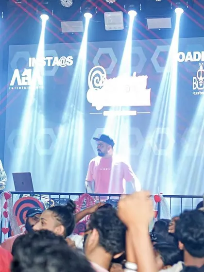 The stage setup for our Valentine's event was top-notch, with massive LED screens and lighting rigs.