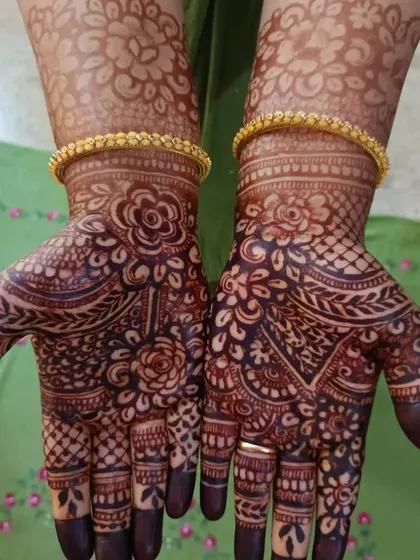 A perfect example of a mature henna stain. The color is rich and even, highlighting all the intricate details of the design.